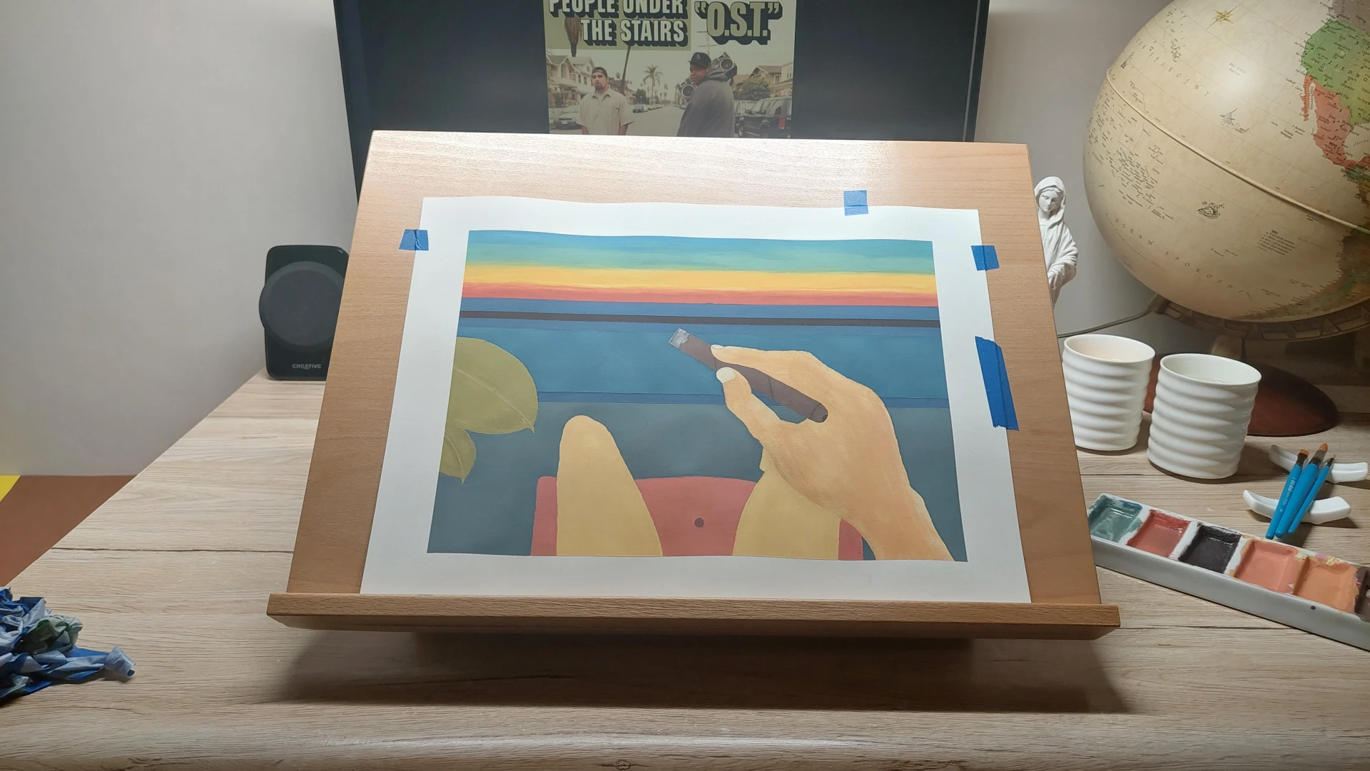 The completed painting after removing all the border tape, revealing crisp edges.