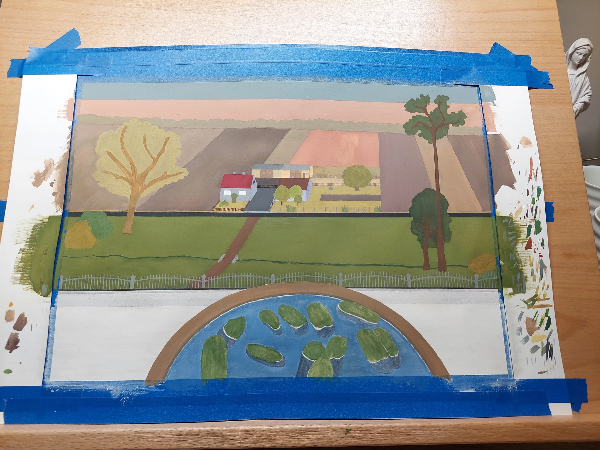 Detailed view of fresh cucumbers in a bowl of water on the countertop.